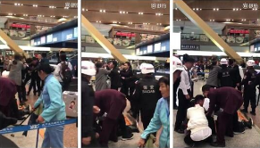 乘客机场人员扭打